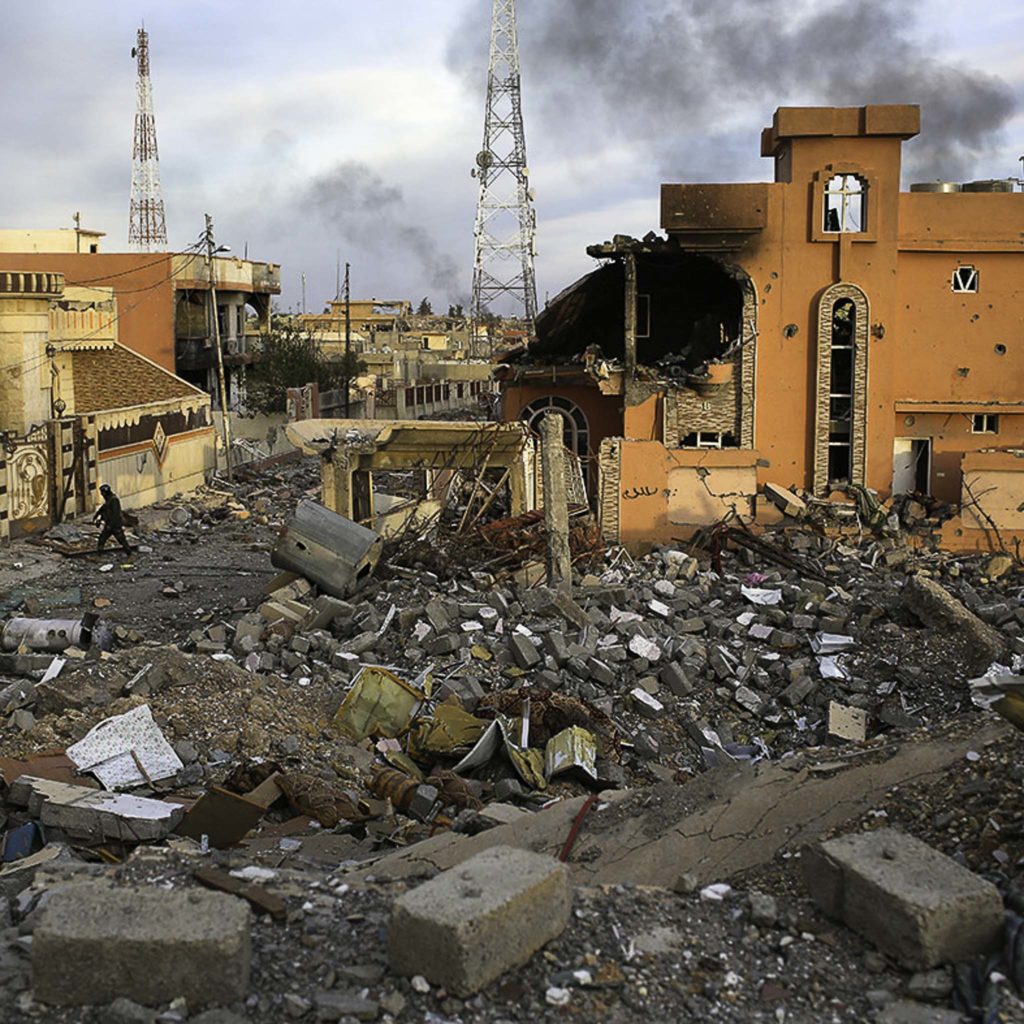 Smoke, rubble and ruined buildings after an apparent bombing