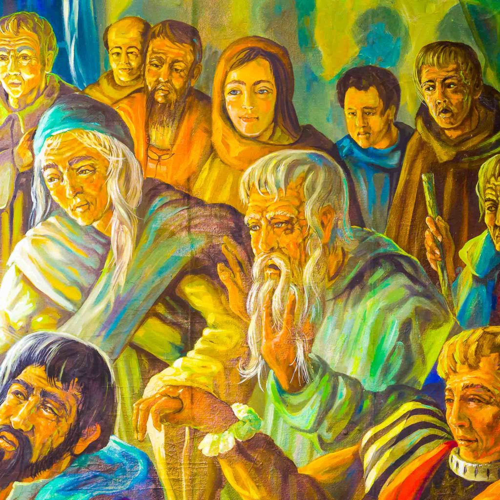 Men and women watch a baptism scene.
