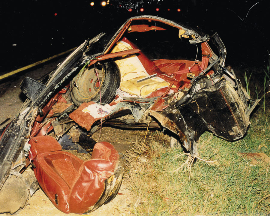 leftover wreckage of a car torn apart in an accident.