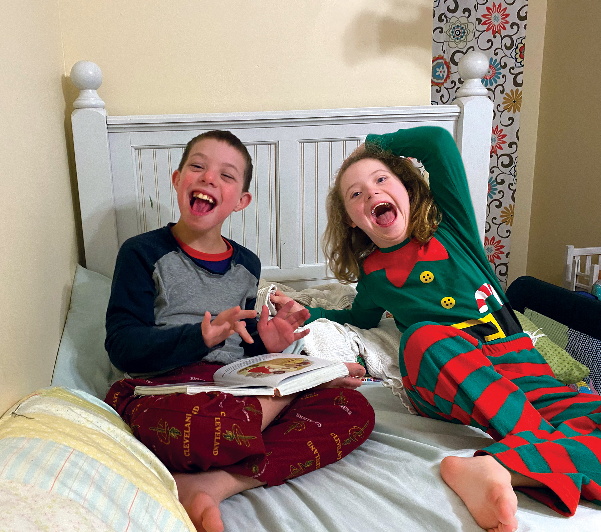 Two of Marlin's kids, Adelaide and Bennett, ready for a bedtime Bible story