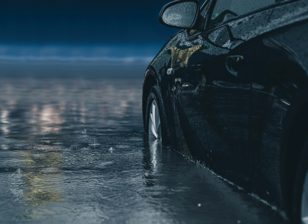 car sitting in flood waters
